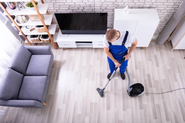 High Angle View Male Janitor Cleaning Floor Vacuum Cleaner — Stock Photo, Image