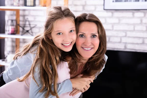 Portrait Happy Mature Mother Giving Piggyback Her Daughter — Stock Photo, Image