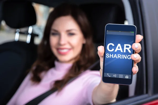 Close Woman Hand Sitting Car Showing Car Sharing App Smartphone — Stock Photo, Image