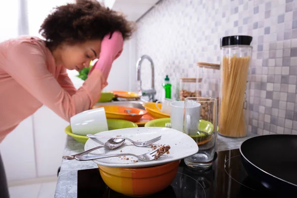 Tired Young Woman Leaning Sink Dirty Colorful Utensils Kitchen — Stock Photo, Image