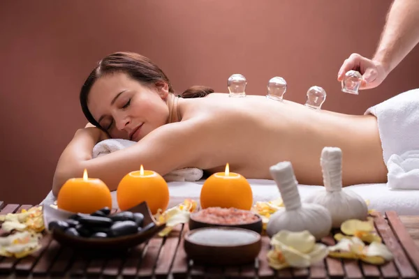 Relaxed Young Woman Receiving Cupping Treatment Her Back Spa — Stock Photo, Image