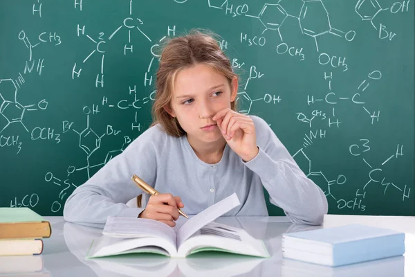 Portrait Contemplated Female Student Front Chemical Formulas Chalkboard — Stock Photo, Image
