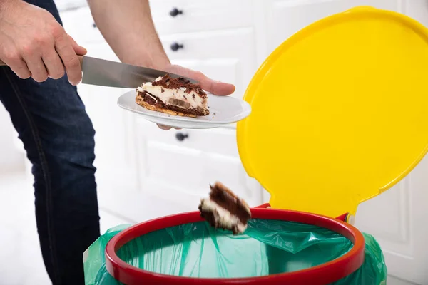 Close Man Hand Throwing Cake Trash Bin — Stock Photo, Image