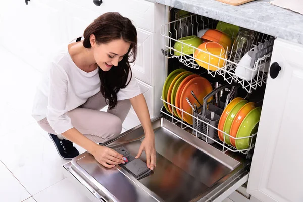 Happy Young Woman Putting Soap Tablet Dishwasher Box — Stock Photo, Image