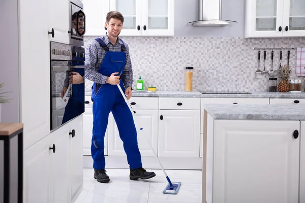 Smiling Male Janitor Cleaning Floor Mop Kitchen — Stock Photo, Image