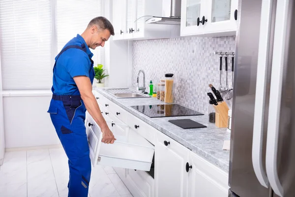 Happy Handyman Fixing Drawer Cabinet Home — Stok Foto