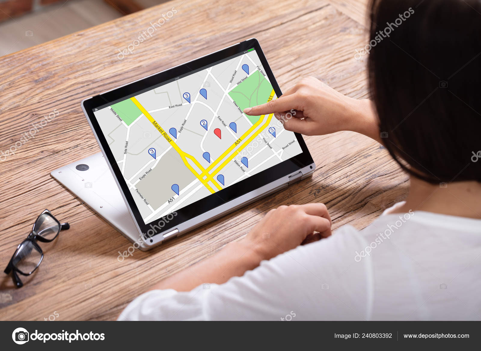 Close Hand Using Gps Navigation Map Laptop Stock by ©AndreyPopov 240803392