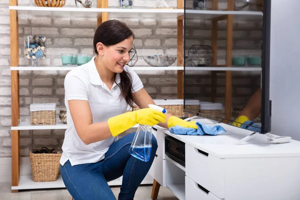 Smiling Young Woman Cleaning Furniture Napkin — Stock Photo, Image