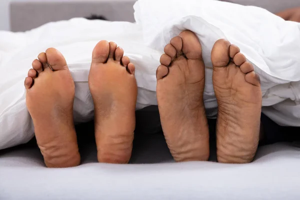Close Couple Bare Feet White Blanket — Stock Photo, Image