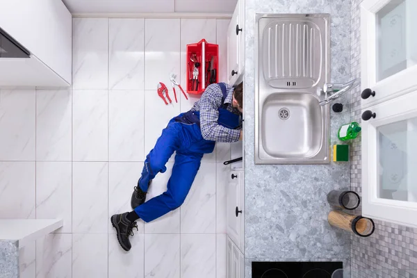 Young Male Plumber Repairing Sink Pipe Adjustable Wrench — Stock Photo, Image