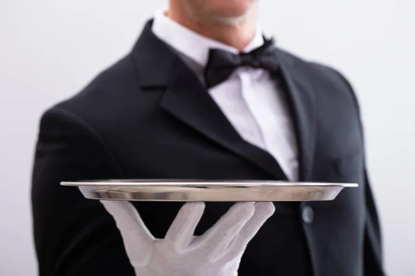 Close Waiter Hand Holding Empty Silver Tray White Background — Stock Photo, Image