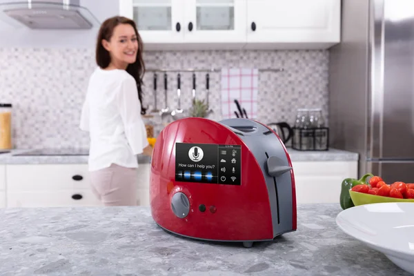 Happy Woman Looking Red Toaster Voice Recognition Function Kitchen Counter — Stock Photo, Image