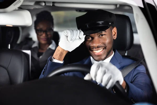 Portrait Smiling Male Chauffeur Driving Car Businesswoman Background — Stock Photo, Image