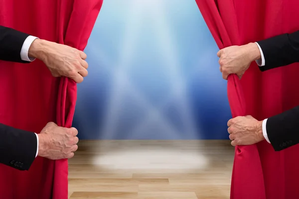 Two People Opening Red Curtain Spots Lights Stage — Stock Photo, Image