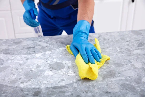 Mid Section Male Janitor Cleaning Dirty Kitchen Counter Spray Bottle — Stock Photo, Image