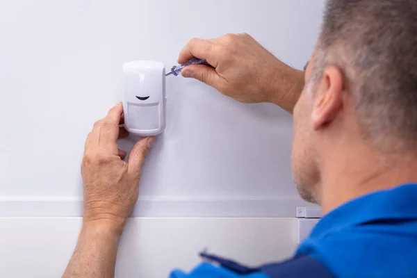 Close Male Electrician Installing Security System Door Sensor Wall — Stock Photo, Image