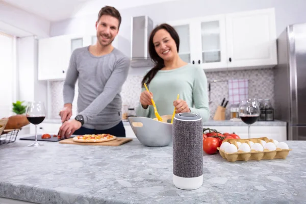 Happy Young Couple Preparing Food Front Wireless Speaker Kitchen — Stock Photo, Image