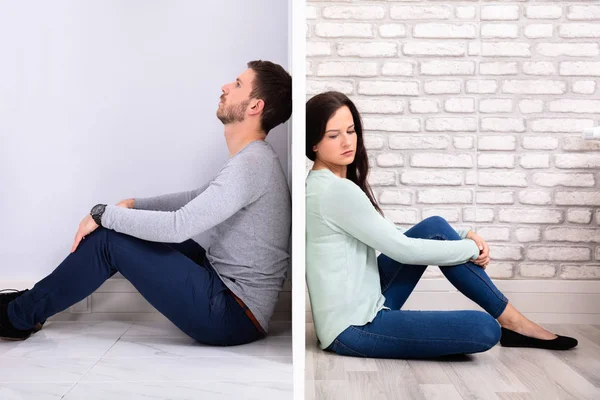 Sad Young Couple Sitting Back Back Floor Home — Stock Photo, Image