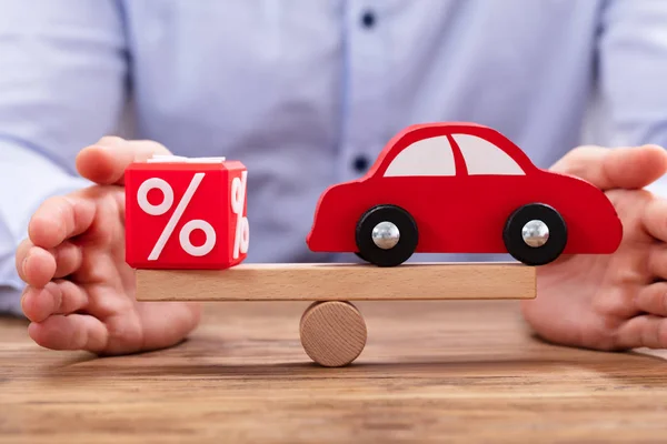 Businessperson Hand Protecting Balance Cubic Block Percentage Symbol Red Car — Stock fotografie