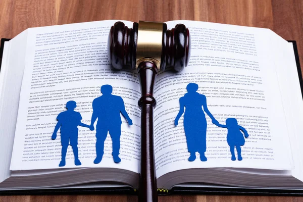 Blue Paper Cutout Separated Family Open Book Gavel Wooden Table — Stock Photo, Image