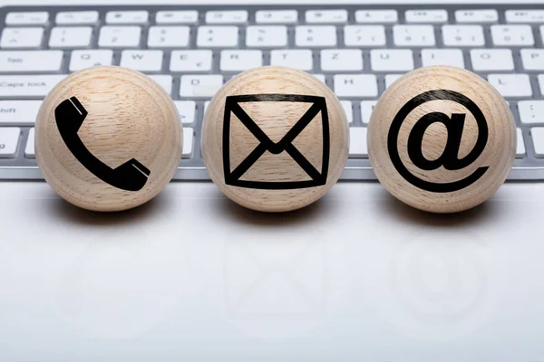 Three Wooden Sphere Shape Ball Contact Icon Front White Keyboard — Stock Photo, Image