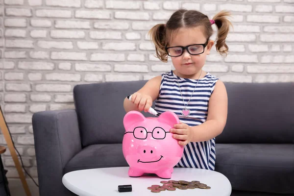 Happy Cute Girl Painting Piggy Bank Black Marker Home — Stock Photo, Image