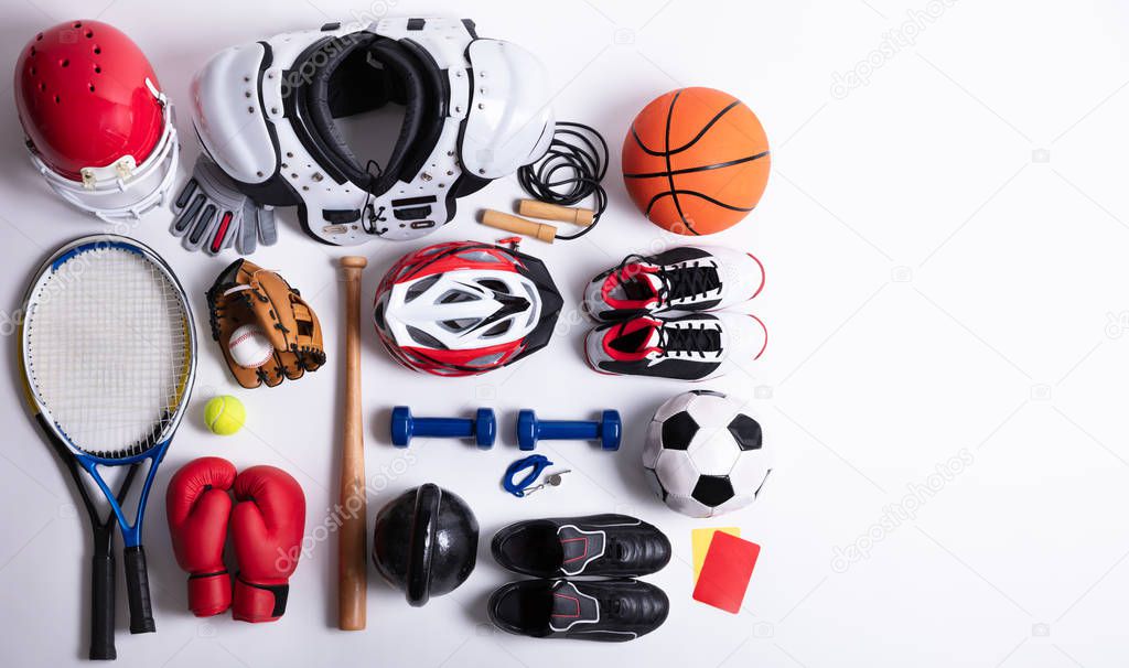 High Angle View Of Various Sport Equipment On White Background