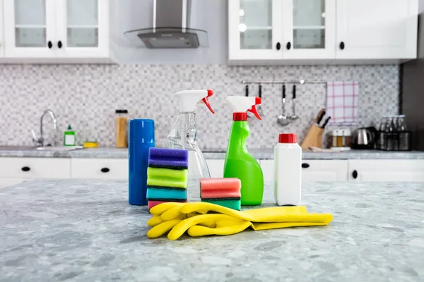 Close Cleaning Supplies Yellow Handgloves Kitchen Countertop — Stock Photo, Image