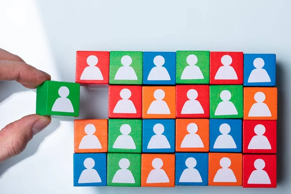 Businessperson Hand Holding Green Cubic Block Team Red Green Blocks — Stock Photo, Image