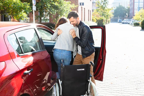 Man Assisting Her Handicapped Wife Get Out Car Sit Wheelchair — Stock Photo, Image