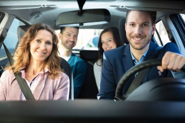 Group Of Happy Friends Having Fun In The Car clipart