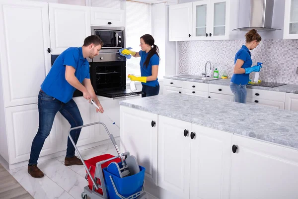 Group Young Janitors Uniform Cleaning Kitchen Home — Stock Photo, Image