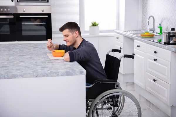 Side View Smiling Disabled Young Man Sitting Wheelchair Drinking Soup — Stock Photo, Image