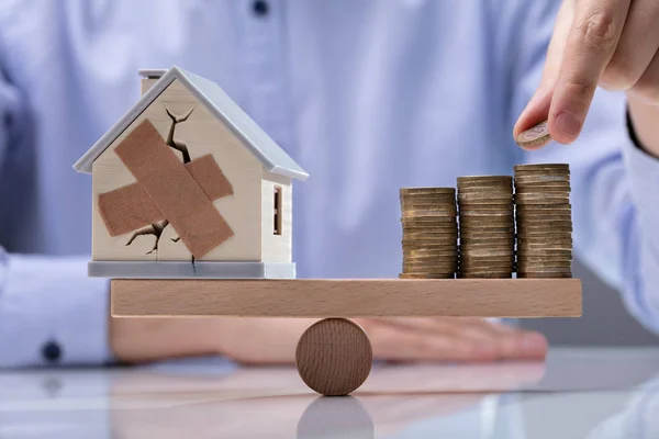 Man Hand Placing Coin Top Stack Coins Broken House Seesaw — Stock Photo, Image