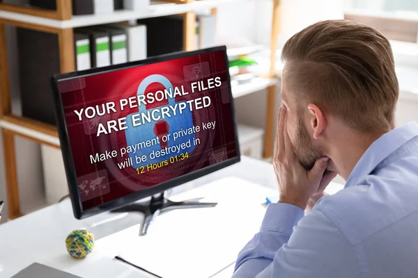 Worried Businessman Looking Computer Ransomware Word Screen Workplace — Stok Foto