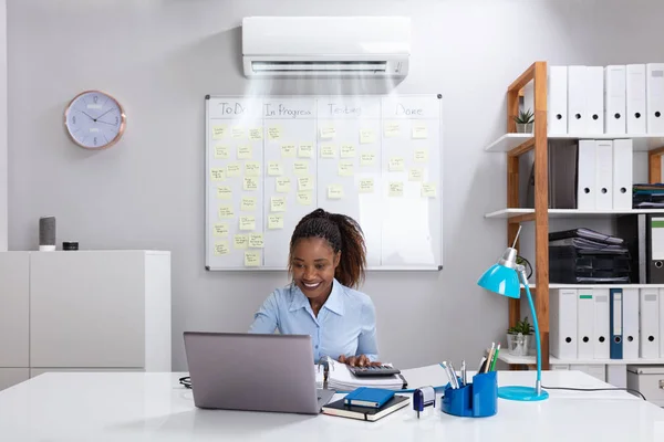 Smiling Businesswoman Enjoying Cooling Air Conditioner Using Laptop Workplace — Stock Photo, Image