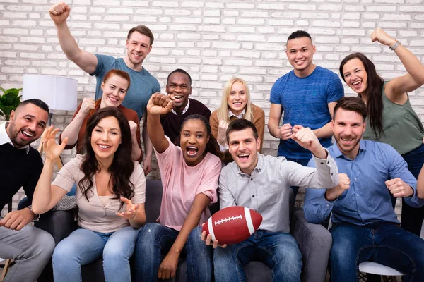 Young Friends Cheering While Watching Rugby Match Home — Stock Photo, Image