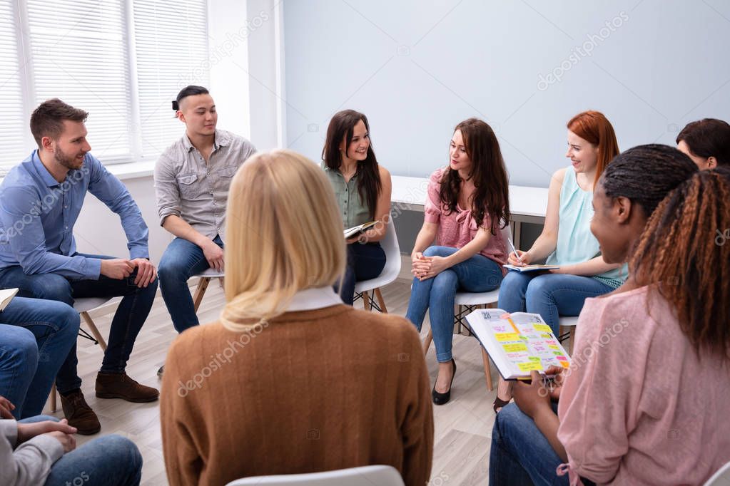 Group Of Multi-ethnic Friend Having Group Discussion