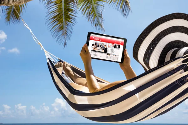 Woman Lying Hammock Watching News Digital Tablet Blue Sky Beach — Stock Photo, Image