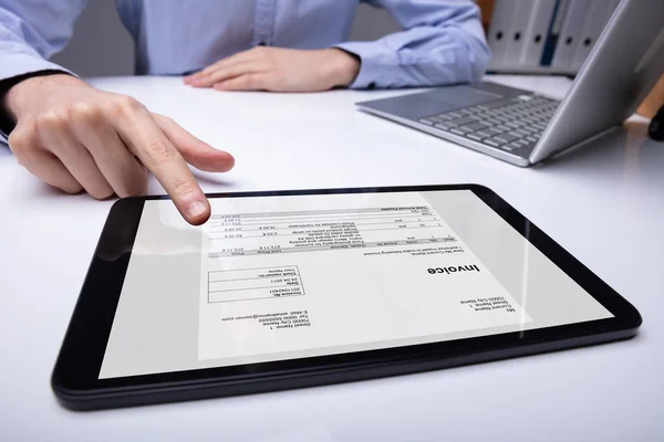 Close Businessman Hand Checking Invoice Tablet Desk — Stok Foto