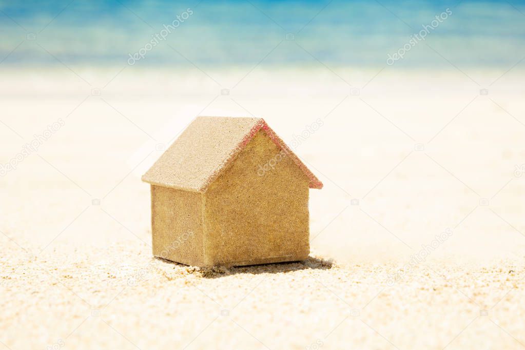 Close-up Of Miniature Sand House On Beach