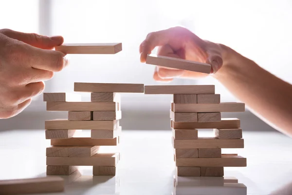 Close Human Hand Placing Wooden Block Desk — Stock Photo, Image