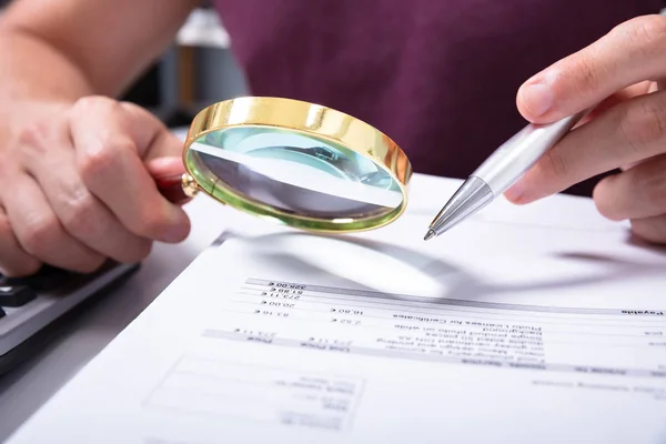 Close Accountant Hand Holding Magnifying Glass Checking Bill Workplace — Stock Photo, Image