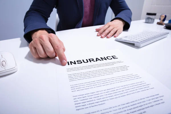 Mid Section Businessman Showing Insurance Document White Desk Office — Stock Photo, Image