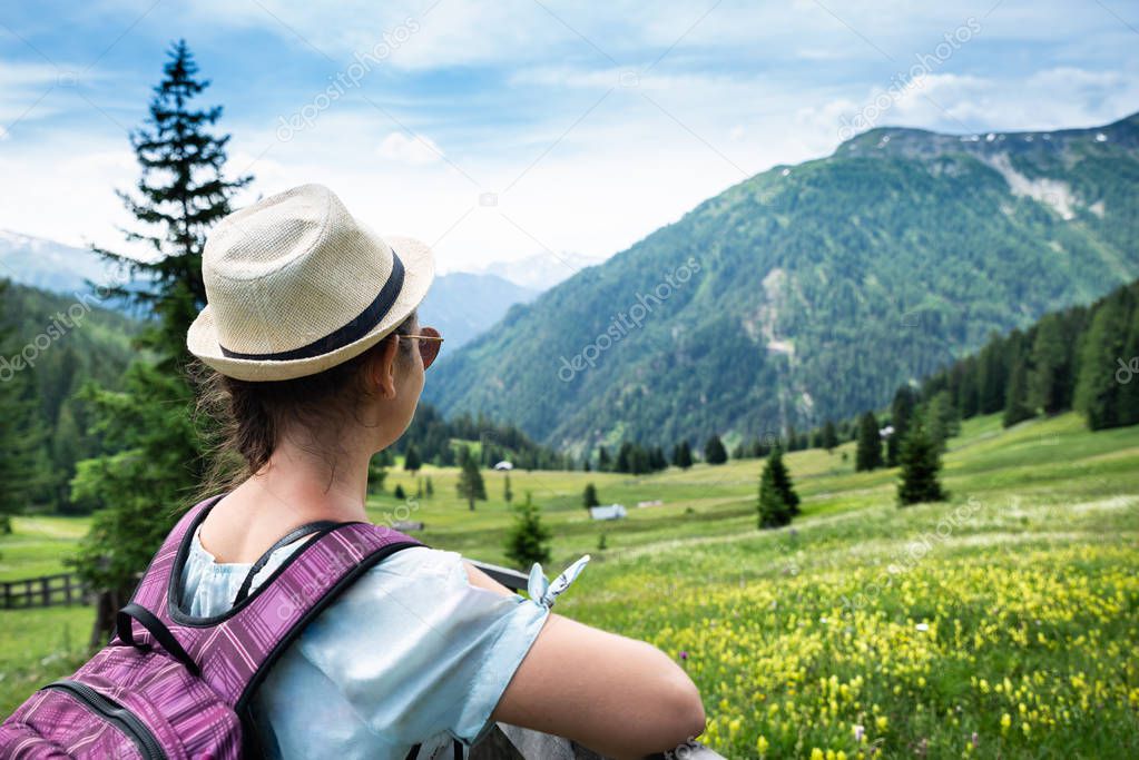 Woman With Backpack Enjoying Panoramic Mountain View