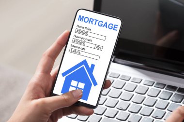 Cep Telefonunda Kadın Eli Dolum Mortgage Başvuru Formu