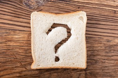 Ahşap Masa Üzerinde Soru İşareti İşareti Ile Ekmek Dilimi