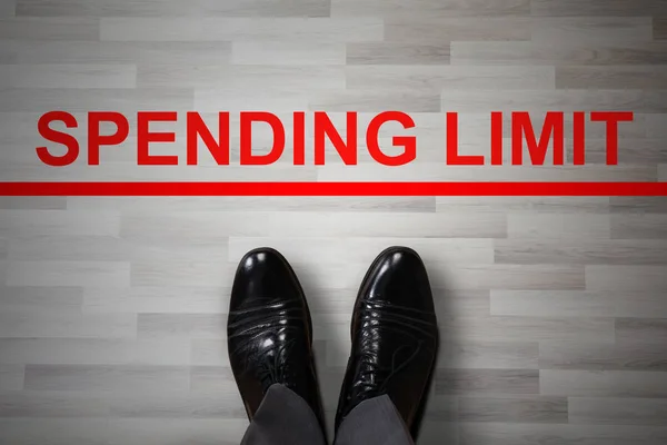 Businessman Foot Black Shoes Standing Spending Limit Red Forbidden Line — Stock Photo, Image