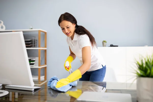 Side View Female Janitor Cleaning Desk Blue Napkin Office — Stock Photo, Image