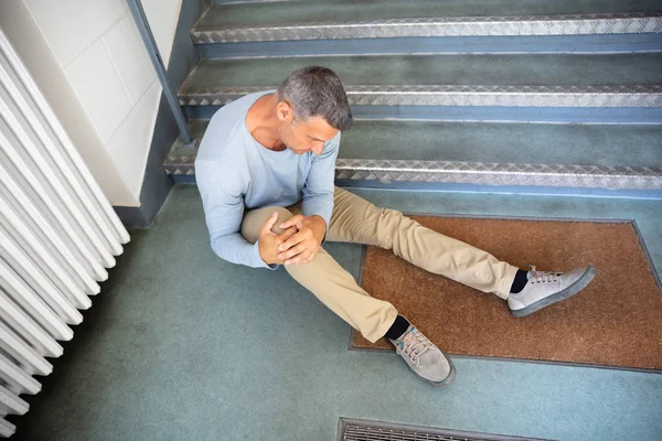 Mature Man Sitting Staircase Slip Fall Accident — Stock Photo, Image